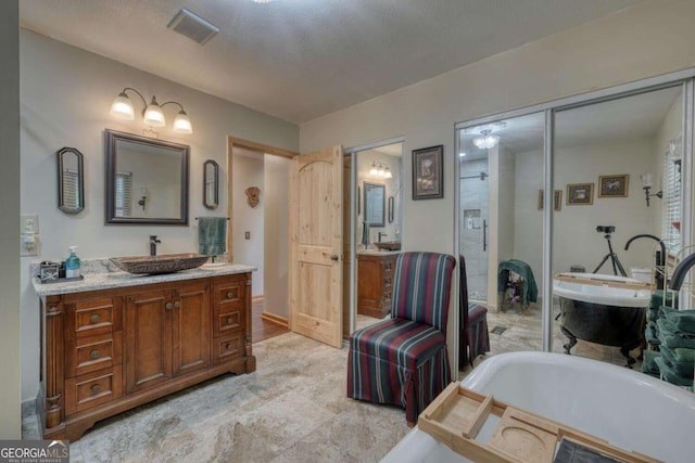 19 Deer Trl, Blairsville, GA 30512 - bathroom featuring a freestanding tub and vanity