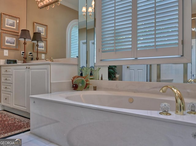 307 Worthing Ln, Mcdonough, GA 30253 - full bathroom featuring a chandelier, crown molding, tile patterned flooring, vanity, and a bath