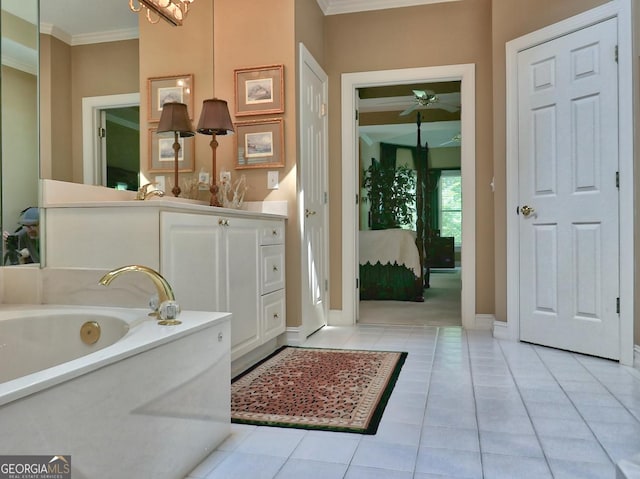 307 Worthing Ln, Mcdonough, GA 30253 - full bathroom featuring crown molding, a garden tub, vanity, tile patterned flooring, and a chandelier