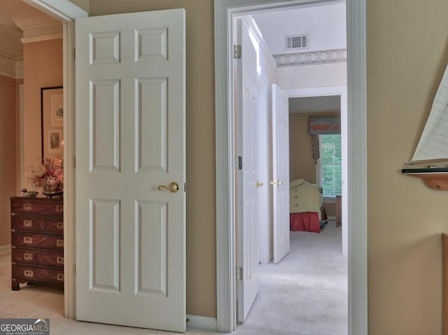 307 Worthing Ln, Mcdonough, GA 30253 - hall featuring light colored carpet and ornamental molding