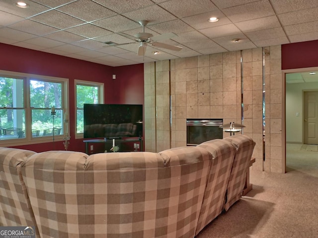 307 Worthing Ln, Mcdonough, GA 30253 - living room featuring carpet floors, ceiling fan, recessed lighting, and a drop ceiling