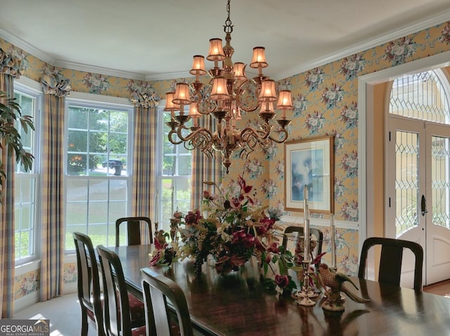 307 Worthing Ln, Mcdonough, GA 30253 - dining room with wallpapered walls, a chandelier, crown molding, and french doors