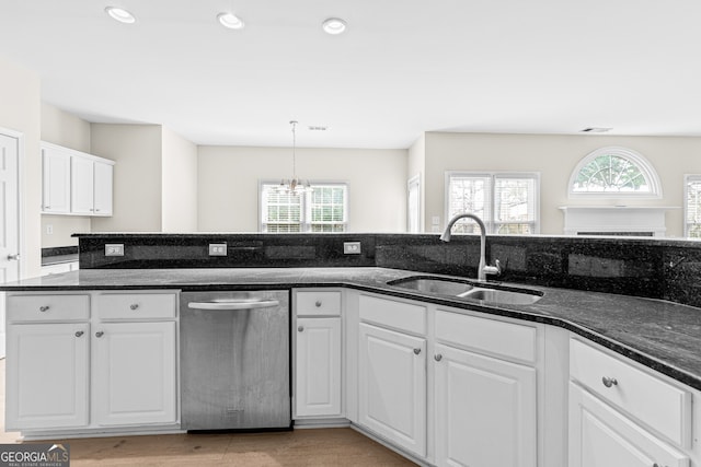 2030 Brook Meadow Dr, Alpharetta, GA 30005 - kitchen with stainless steel dishwasher, healthy amount of natural light, white cabinetry, a chandelier, and recessed lighting