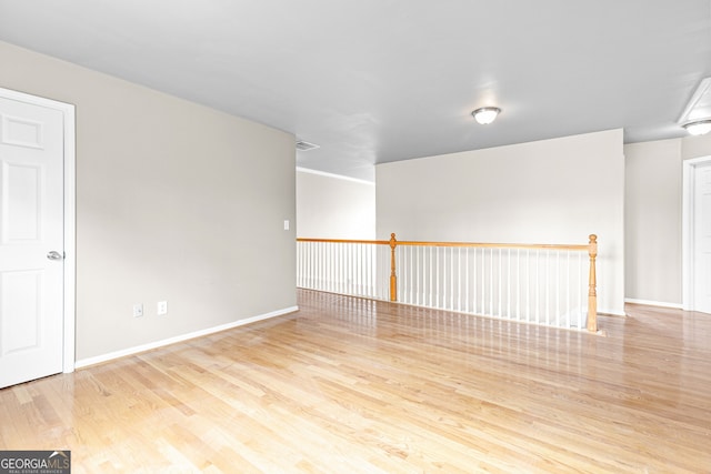 2030 Brook Meadow Dr, Alpharetta, GA 30005 - spare room with wood finished floors and baseboards
