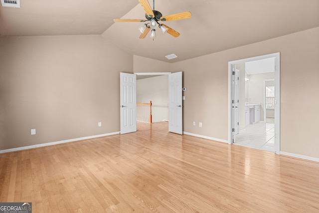 2030 Brook Meadow Dr, Alpharetta, GA 30005 - unfurnished bedroom featuring light wood-style floors, lofted ceiling, connected bathroom, and a ceiling fan
