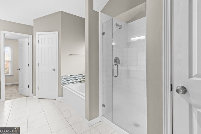 2030 Brook Meadow Dr, Alpharetta, GA 30005 - bathroom featuring a shower stall, a garden tub, and tile patterned flooring