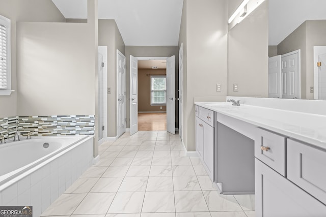 2030 Brook Meadow Dr, Alpharetta, GA 30005 - bathroom with vanity, a garden tub, a shower stall, and marble finish flooring