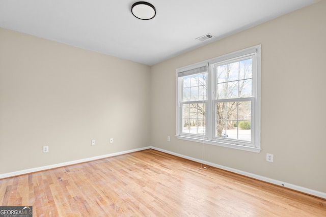 2030 Brook Meadow Dr, Alpharetta, GA 30005 - spare room featuring baseboards and wood finished floors
