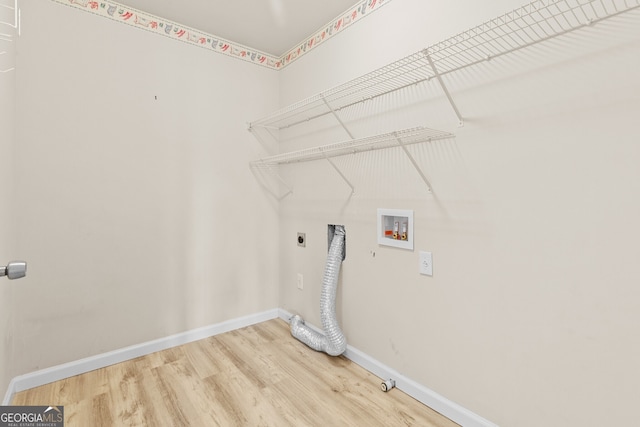 2030 Brook Meadow Dr, Alpharetta, GA 30005 - laundry area with electric dryer hookup, hookup for a washing machine, and wood finished floors