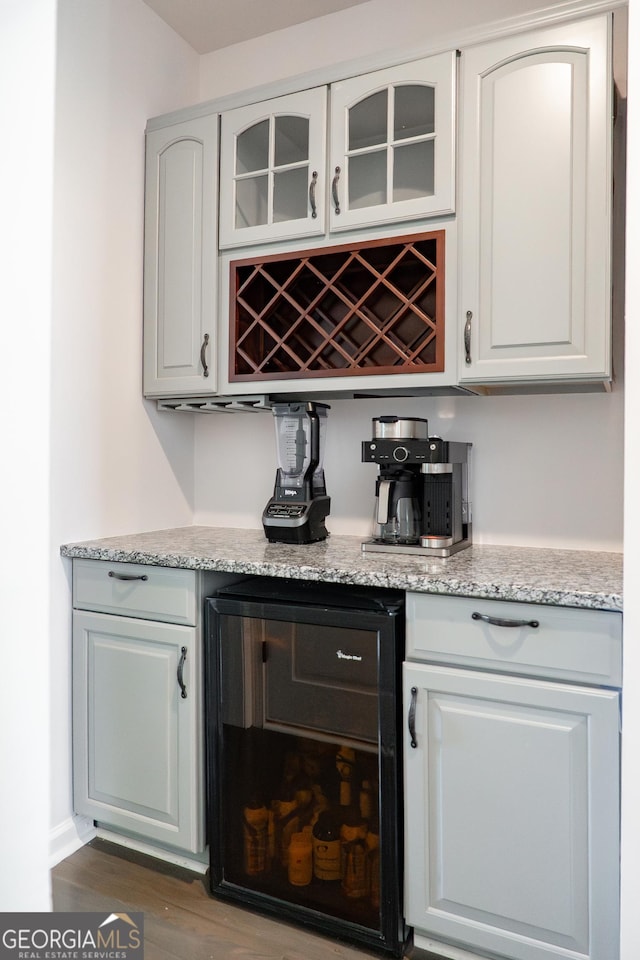 4046 Creekview Ridge Dr, Buford, GA 30518 - bar with wine cooler and wood finished floors