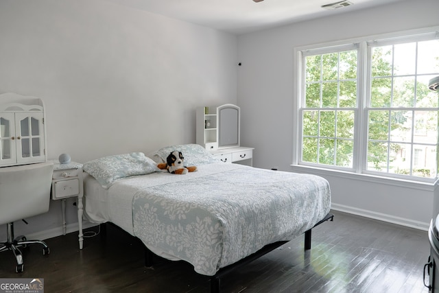 4046 Creekview Ridge Dr, Buford, GA 30518 - bedroom featuring multiple windows and wood finished floors