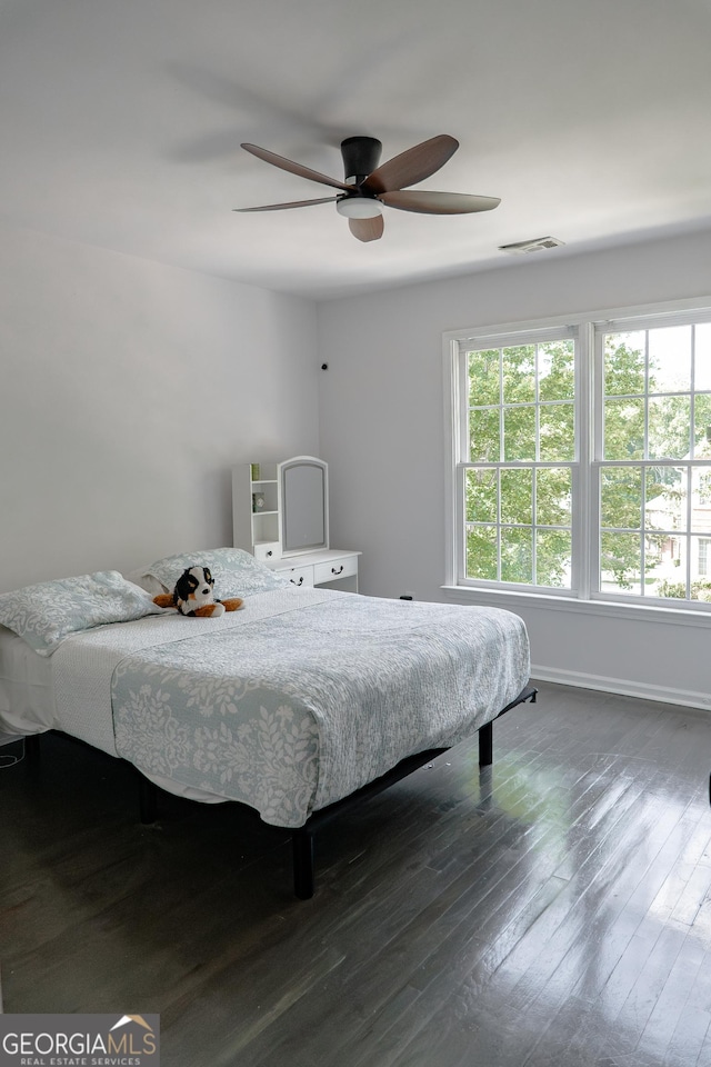 4046 Creekview Ridge Dr, Buford, GA 30518 - bedroom with dark wood-style flooring and ceiling fan
