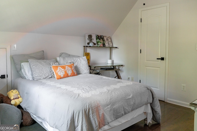 4046 Creekview Ridge Dr, Buford, GA 30518 - bedroom with wood finished floors and vaulted ceiling