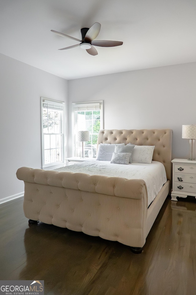 4046 Creekview Ridge Dr, Buford, GA 30518 - bedroom featuring dark wood-style floors and ceiling fan