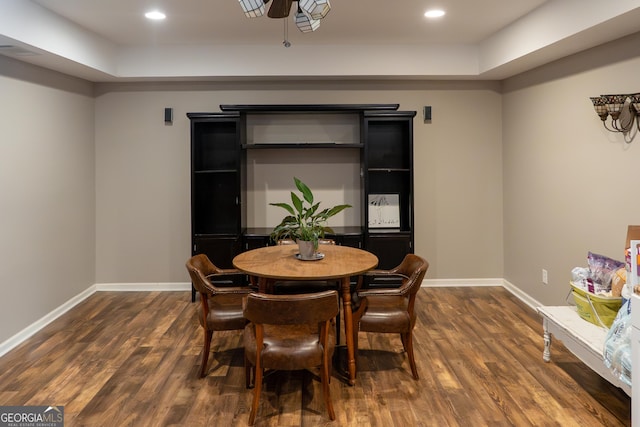 4046 Creekview Ridge Dr, Buford, GA 30518 - dining area featuring dark wood-type flooring, recessed lighting, ceiling fan, and a tray ceiling