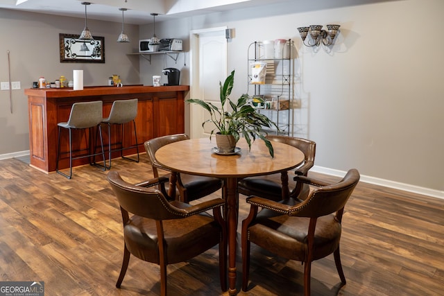 4046 Creekview Ridge Dr, Buford, GA 30518 - dining area with wood finished floors and a dry bar