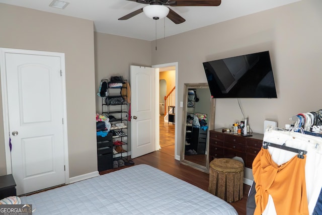 4046 Creekview Ridge Dr, Buford, GA 30518 - bedroom with wood finished floors and a ceiling fan