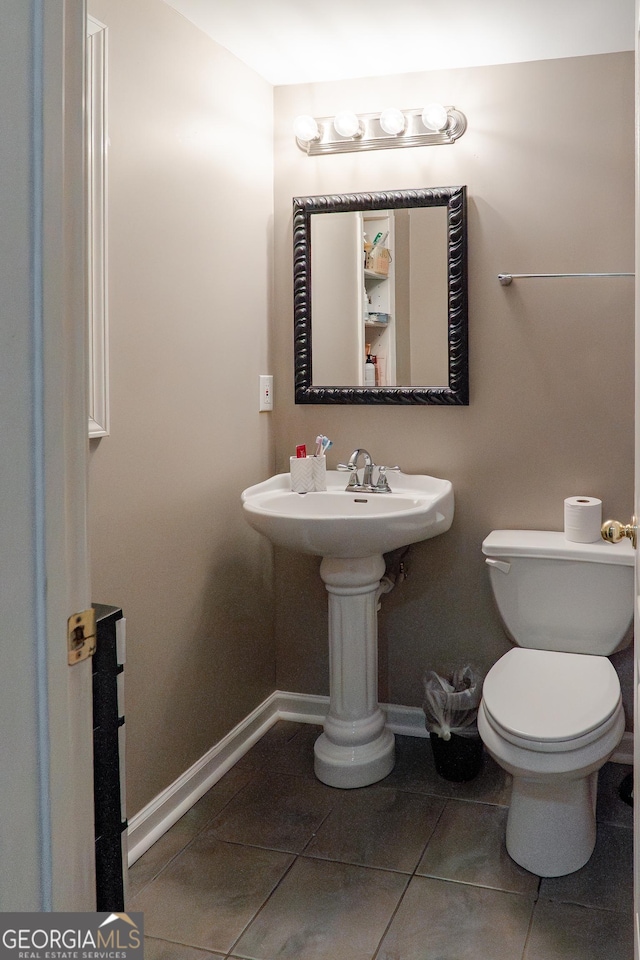 4046 Creekview Ridge Dr, Buford, GA 30518 - half bathroom with baseboards and tile patterned floors