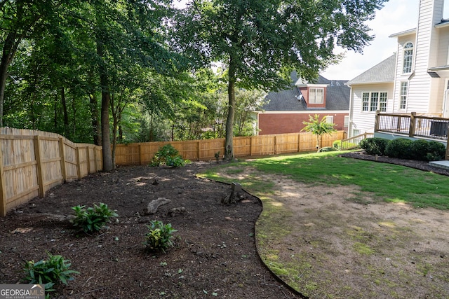 4046 Creekview Ridge Dr, Buford, GA 30518 - fenced backyard featuring a wooden deck