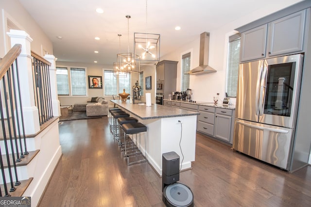 1 Newnan Views Cir, Newnan, GA 30263 - kitchen featuring stainless steel appliances, gray cabinets, wall chimney range hood, dark wood-style flooring, and open floor plan