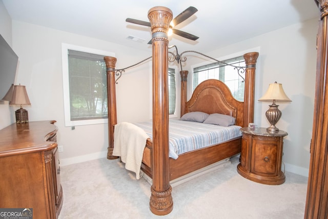 1 Newnan Views Cir, Newnan, GA 30263 - bedroom with light colored carpet, baseboards, and ceiling fan