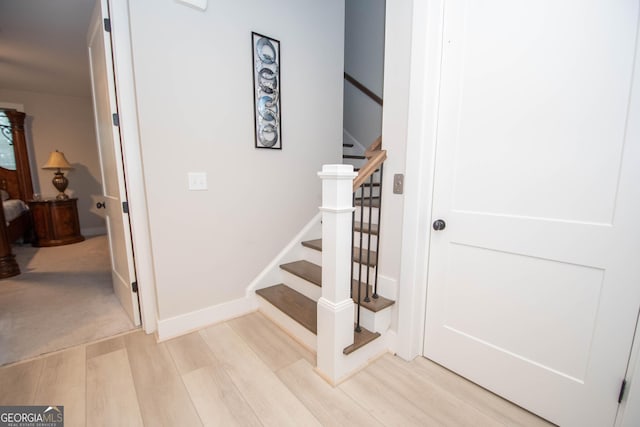 1 Newnan Views Cir, Newnan, GA 30263 - stairs with wood finished floors and baseboards