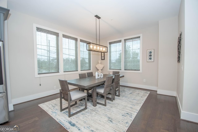 1 Newnan Views Cir, Newnan, GA 30263 - dining space featuring a chandelier, baseboards, and dark wood-style flooring