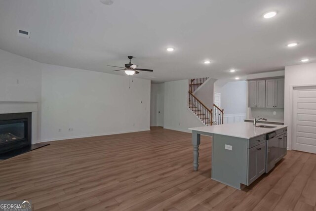 420 Tavistock Ct, Mcdonough, GA 30252 - kitchen featuring gray cabinets, open floor plan, ceiling fan, and recessed lighting