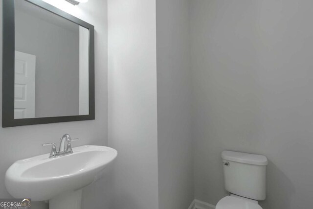 420 Tavistock Ct, Mcdonough, GA 30252 - half bath with a sink and toilet