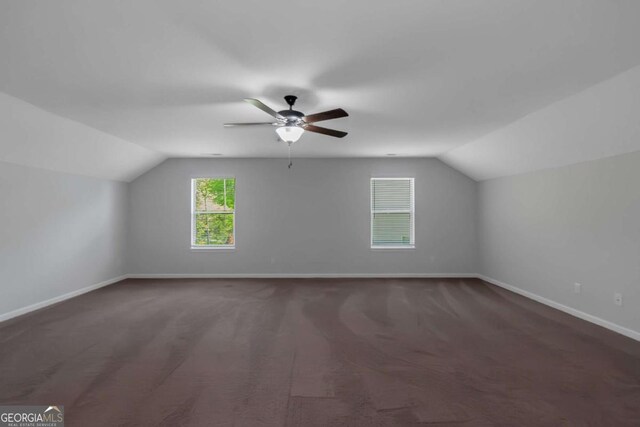 420 Tavistock Ct, Mcdonough, GA 30252 - additional living space featuring lofted ceiling, a ceiling fan, baseboards, and carpet flooring