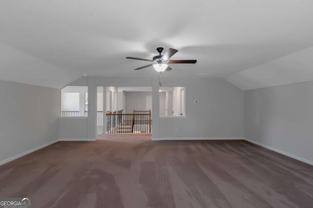 420 Tavistock Ct, Mcdonough, GA 30252 - additional living space featuring lofted ceiling, a ceiling fan, carpet, and baseboards