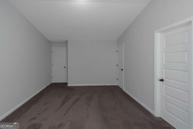 420 Tavistock Ct, Mcdonough, GA 30252 - carpeted empty room featuring baseboards
