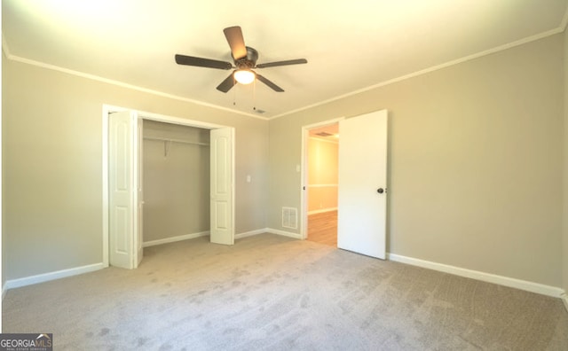 219 Broad St, Carrollton, GA 30117 - unfurnished bedroom featuring carpet flooring, crown molding, a closet, and a ceiling fan