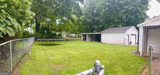 219 Broad St, Carrollton, GA 30117 - view of yard with a trampoline