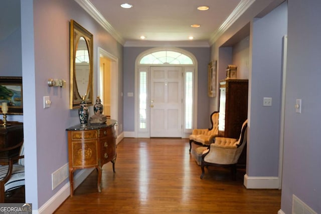 1101 Forrest Hills Dr, Watkinsville, GA 30677 - foyer entrance featuring wood finished floors, recessed lighting, and crown molding