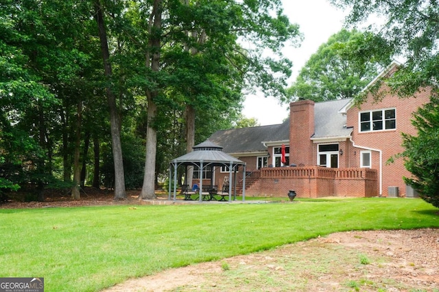 1101 Forrest Hills Dr, Watkinsville, GA 30677 - back of property featuring a gazebo, a lawn, a chimney, and brick siding