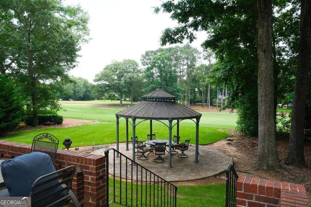 1101 Forrest Hills Dr, Watkinsville, GA 30677 - view of patio / terrace with a gazebo and view of wooded area