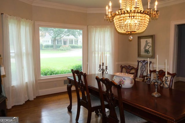 1101 Forrest Hills Dr, Watkinsville, GA 30677 - dining area featuring a chandelier, wood finished floors, and ornamental molding