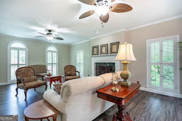 3010 White Oak Ct, Lagrange, GA 30240 - living room with a ceiling fan, dark wood-style floors, ornamental molding, and a premium fireplace