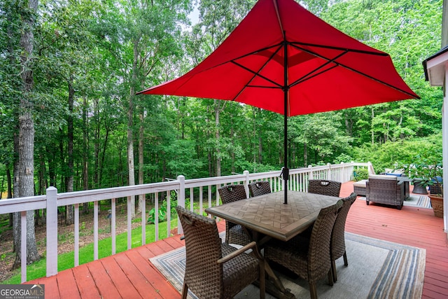 3010 White Oak Ct, Lagrange, GA 30240 - wooden terrace featuring outdoor dining area and a forest view