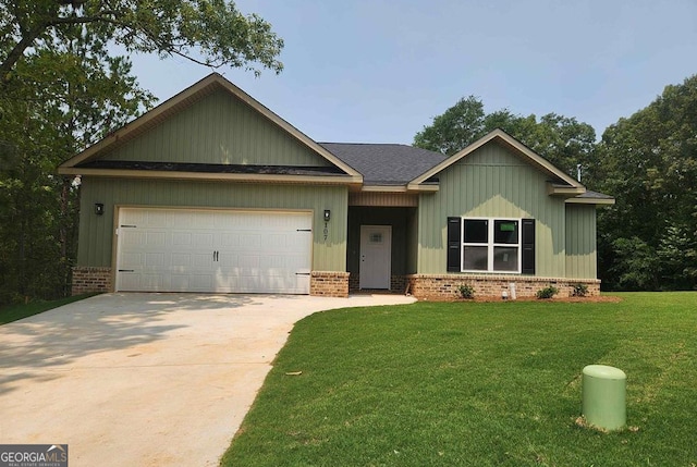 107 Silver Maple Ct, Byron, GA 31008 - view of front facade with brick siding, an attached garage, a front yard, and concrete driveway