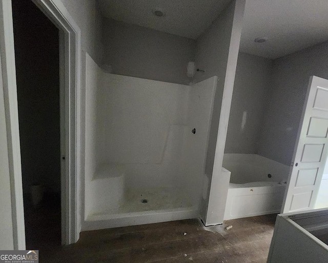 107 Silver Maple Ct, Byron, GA 31008 - bathroom featuring walk in shower and a garden tub
