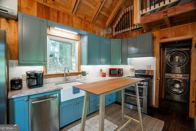 174 Little Rock Creek Ct, Cherry Log, GA 30522 - kitchen featuring appliances with stainless steel finishes, stacked washer / drying machine, wooden ceiling, a sink, and backsplash