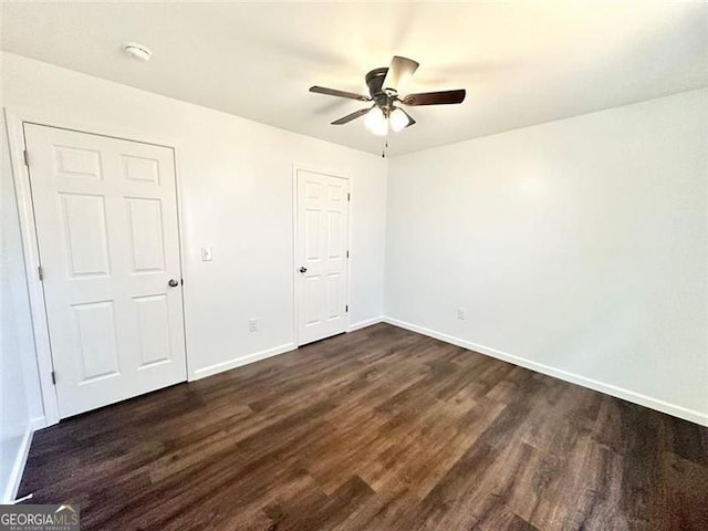 1 Addington Ct NW Unit B, Rome, GA 30165 - unfurnished bedroom featuring dark wood-style floors, baseboards, and a ceiling fan