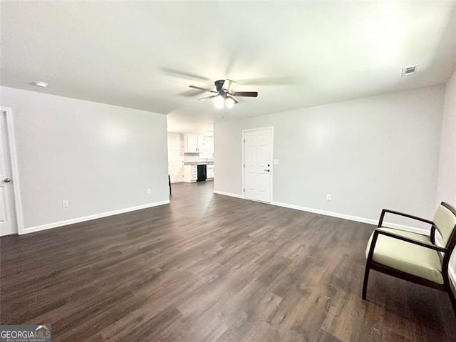 1 Addington Ct NW Unit B, Rome, GA 30165 - unfurnished living room with a ceiling fan, baseboards, and dark wood-style floors