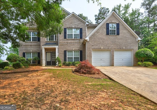 1132 Hargrove Ct, Locust Grove, GA 30248 - traditional-style house featuring brick siding, an attached garage, and concrete driveway