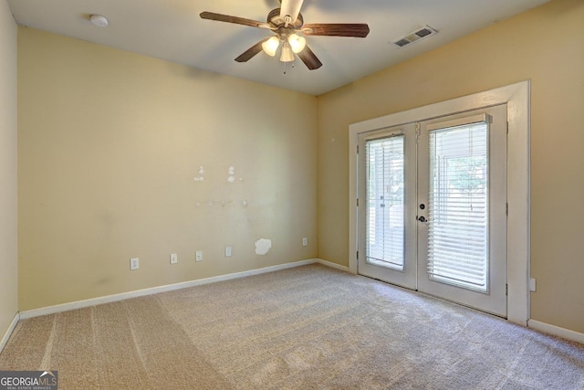 1132 Hargrove Ct, Locust Grove, GA 30248 - unfurnished room featuring french doors, carpet flooring, a ceiling fan, and a smoke detector