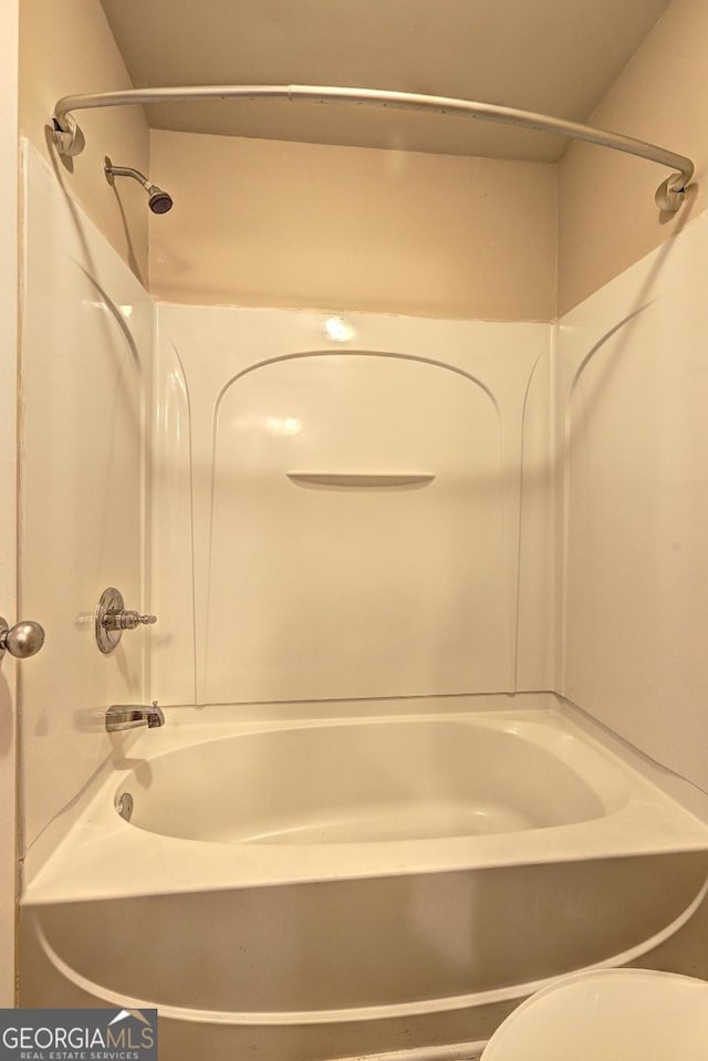 1132 Hargrove Ct, Locust Grove, GA 30248 - bathroom featuring shower / bath combination and toilet