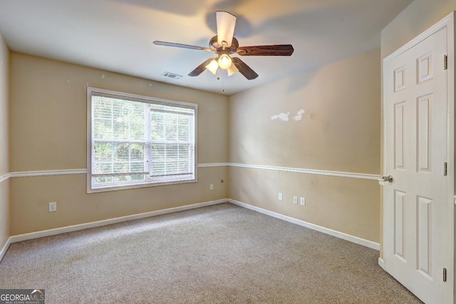 1132 Hargrove Ct, Locust Grove, GA 30248 - unfurnished room with carpet flooring and ceiling fan