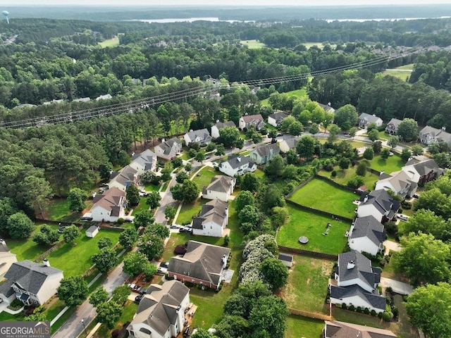 1132 Hargrove Ct, Locust Grove, GA 30248 - aerial view of property's location featuring nearby suburban area and a heavily wooded area
